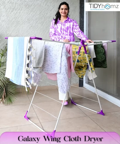 Galaxy cloth dryer stand in use drying clothes in a small apartment or flat